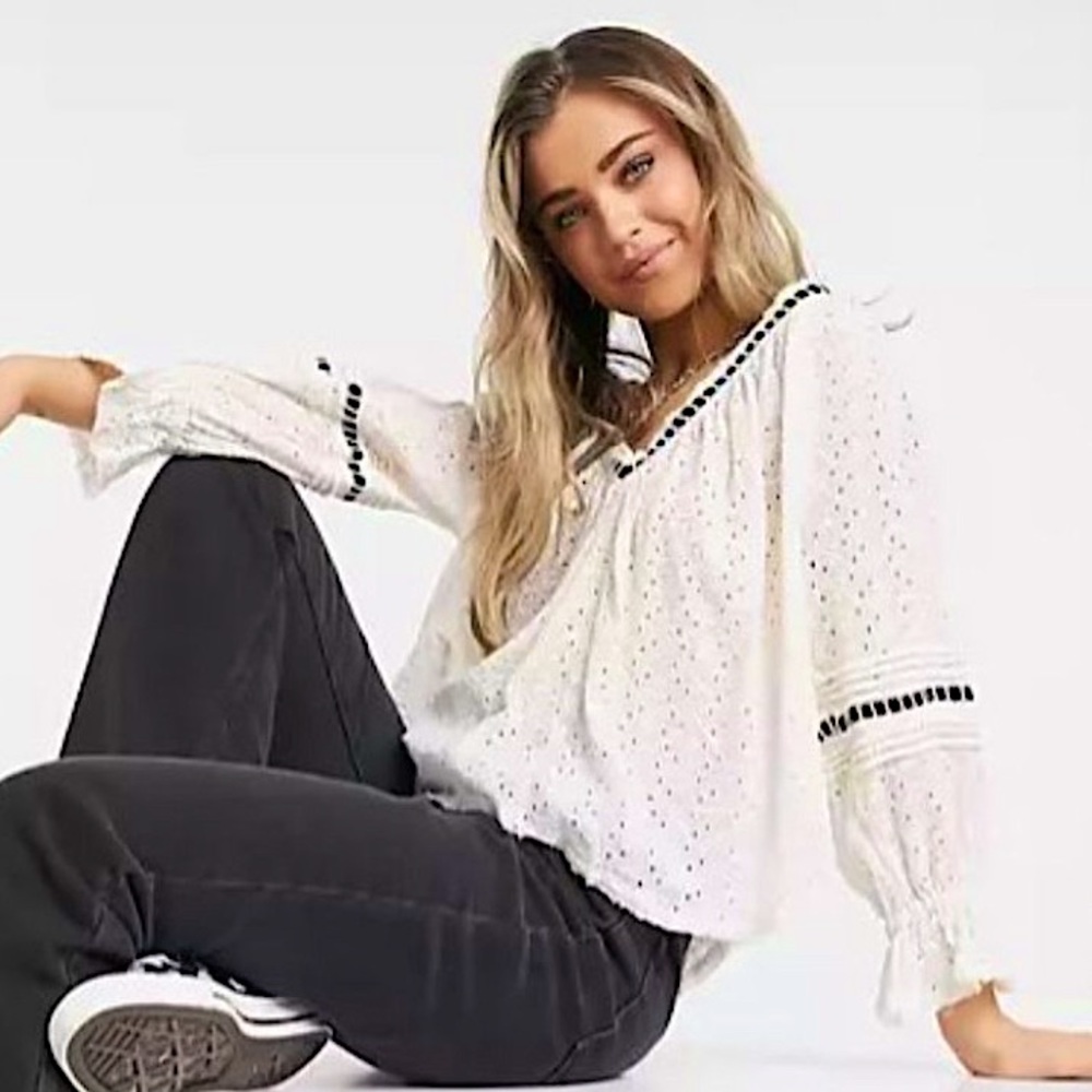 Elegant White Blouse with Black Accents